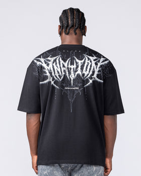 Straight-on back view of the black Gothic Oversized Tee showing the full MNation gothic print