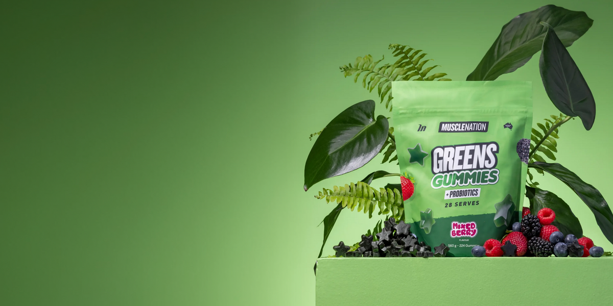 Muscle Nation Greens Gummies Mixed Berry pouch with berries and greenery