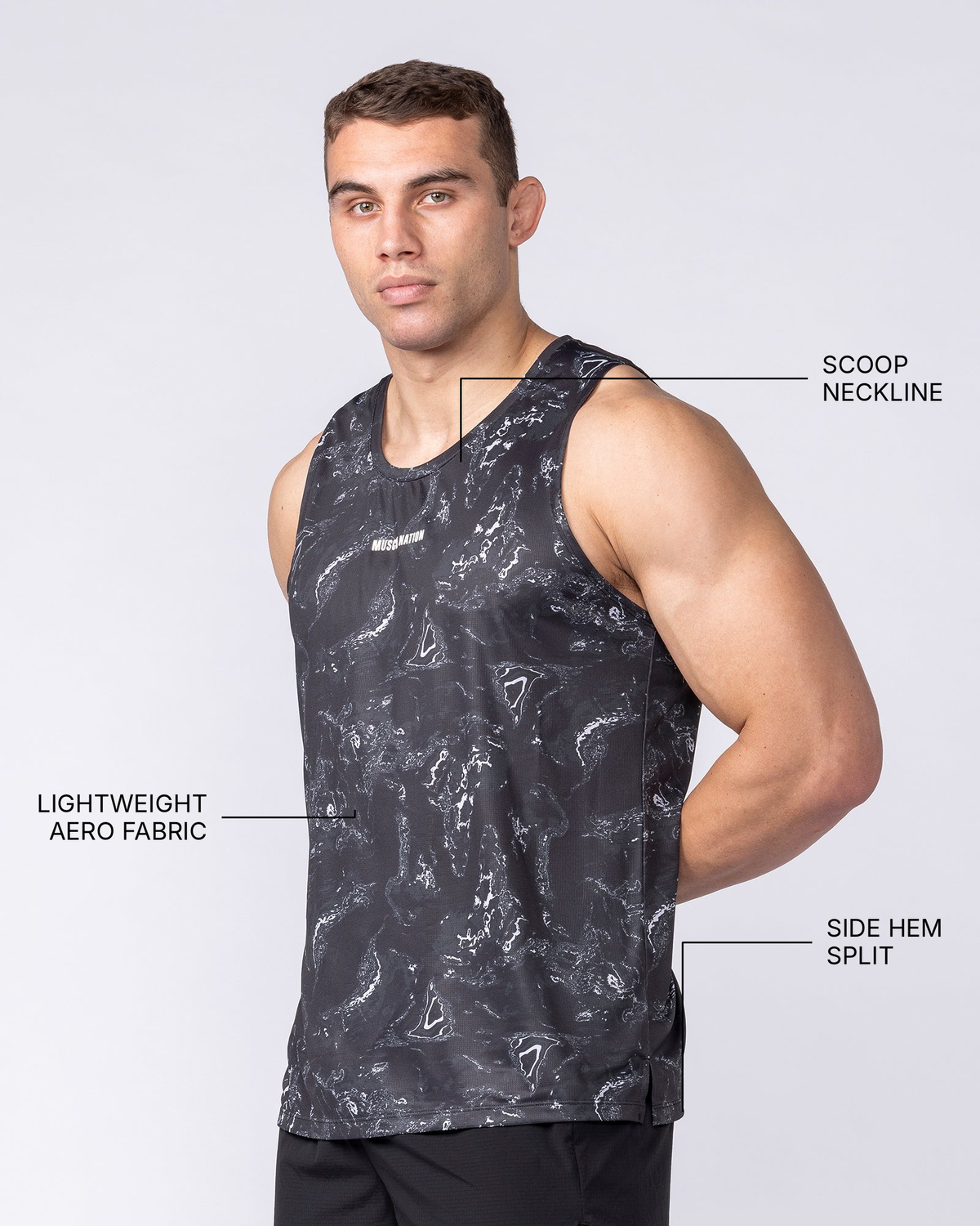 Aero Active Tank - Black Terrain - Muscle Nation feature callouts: scoop neckline, lightweight Aero fabric, side hem split
