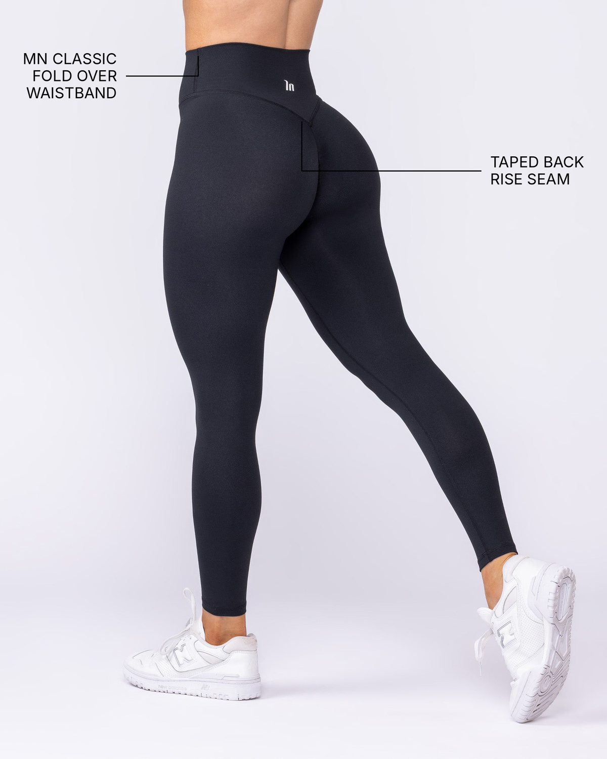 Evolve Signature Ankle Length Leggings - Black - Muscle Nation feature callouts: MN classic fold over waistband, taped back rise seam